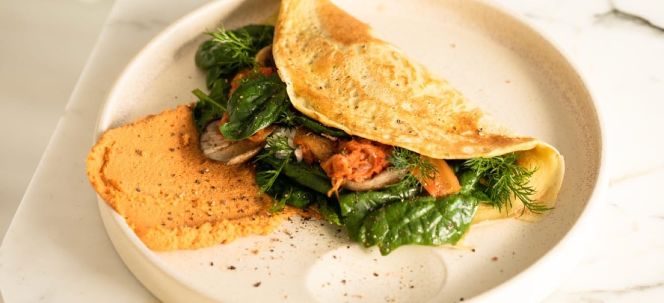 An omelette with chicken and spinach